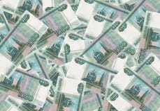 Een stapel duizend-roebel bankbiljetten spreidde uit geld uit Russische munt op een witte achtergrond Royalty-vrije Stock Afbeeldingen Een stapel duizend-roebel bankbiljetten spreidde uit geld uit Russische munt op een witte achtergrond Royalty-vrije Stock Afbeeldingen
