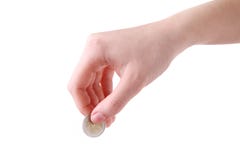 Een vrouwelijke hand houdt een muntstuk geïsoleerd wit bij de studio royalty-vrije stock afbeelding Een vrouwelijke hand houdt een muntstuk geïsoleerd wit bij de studio royalty-vrije stock afbeelding