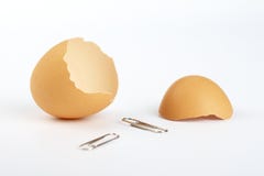 Eggs Shells And Two Clips Stock Photo