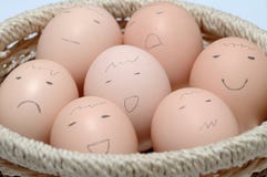 Eggs With Faces In Basket Stock Photos Eggs With Faces In Basket Stock Photos