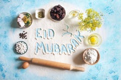 Eid Mubarak - Islamic Holiday Welcome Phrase ` Happy Holiday`, Greeting Reserved. Arabic Baking Background. Royalty Free Stock Images