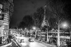 Eiffel tower view and street. At night, monochrome Stock Image Eiffel tower view and street. At night, monochrome Stock Image