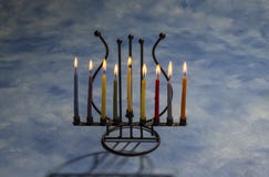 Eight burning Hanukkah candles in Menorah stock image Eight burning Hanukkah candles in Menorah stock image