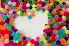 Ein bunter Pom Pom-onwhite Hintergrund, stockfoto Ein bunter Pom Pom-onwhite Hintergrund, stockfoto