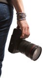 Ein Jugendlicher hält in ihrer Hand eine DSLR-Kamera Getrennt auf wei?em Hintergrund stockbilder Ein Jugendlicher hält in ihrer Hand eine DSLR-Kamera Getrennt auf wei?em Hintergrund stockbilder