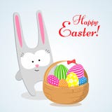 Ein netter Hase ein Kaninchenhäschen und ein Korb mit hellen Ostereiern ein Symbol des Festes dekorativen Gestaltungselements Ost lizenzfreie abbildung Ein netter Hase ein Kaninchenhäschen und ein Korb mit hellen Ostereiern ein Symbol des Festes dekorativen Gestaltungselements Ost lizenzfreie abbildung