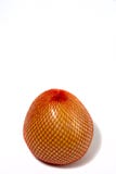 Eine reife Pampelmuse wird in einem Gitter verpackt Pampelmuse lokalisiert auf einem weißen Hintergrund lizenzfreies stockbild Eine reife Pampelmuse wird in einem Gitter verpackt Pampelmuse lokalisiert auf einem weißen Hintergrund lizenzfreies stockbild