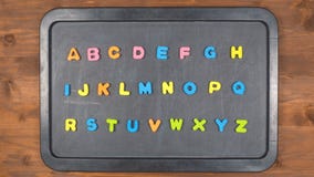 El alfabeto para la animación del movimiento con las letras de la espuma El alfabeto para la animación del movimiento con las letras de la espuma