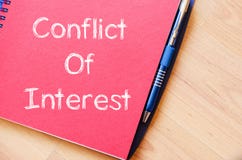 El conflicto de intereses escribe en el cuaderno imágenes de archivo libres de regalías El conflicto de intereses escribe en el cuaderno imágenes de archivo libres de regalías
