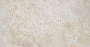 El fondo o la textura de mármol beige natural, ideal afila en toda la superficie imagen de archivo libre de regalías El fondo o la textura de mármol beige natural, ideal afila en toda la superficie imagen de archivo libre de regalías