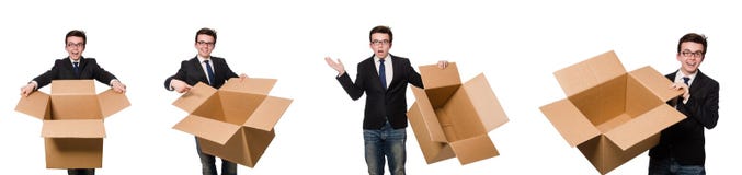El hombre divertido con las cajas en blanco fotos de archivo libres de regalías El hombre divertido con las cajas en blanco fotos de archivo libres de regalías