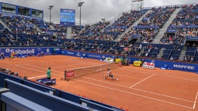 El jugador de Kei Nishikori en la Barcelona se abre, un torneo de tenis anual para el jugador profesional masculino foto de archivo libre de regalías El jugador de Kei Nishikori en la Barcelona se abre, un torneo de tenis anual para el jugador profesional masculino foto de archivo libre de regalías