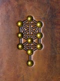 El árbol de la vida, símbolo de Kabbalah grabado en relieve al cuero marrón envejecido imagen de archivo El árbol de la vida, símbolo de Kabbalah grabado en relieve al cuero marrón envejecido imagen de archivo