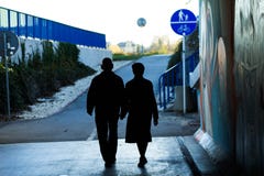 An elderly couple holding hands on the street. This is Love! royalty free stock image An elderly couple holding hands on the street. This is Love! royalty free stock image