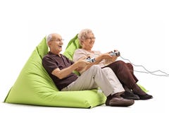 Elderly couple playing video games royalty free stock images Elderly couple playing video games royalty free stock images
