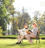 Elderly Couple Relaxing On A Beautiful Day In Park Royalty Free Stock Image Elderly Couple Relaxing On A Beautiful Day In Park Royalty Free Stock Image