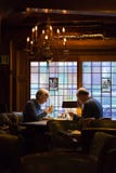 Elderly European couple dining at a romantic restaurant royalty free stock photo Elderly European couple dining at a romantic restaurant royalty free stock photo