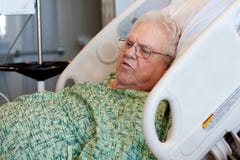 Elderly Male Hospital Patient Is Visiting Stock Images