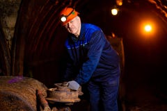 Elderly man in a protective suit and helmet royalty free stock photography Elderly man in a protective suit and helmet royalty free stock photography