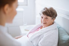 Elderly woman and young volunteer at nursing home royalty free stock images Elderly woman and young volunteer at nursing home royalty free stock images