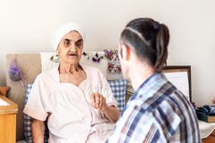 Very old senior woman having a conversation with her grandson stock photos Very old senior woman having a conversation with her grandson stock photos