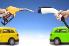 Electric car and gasoline car concept stock photography Electric car and gasoline car concept stock photography