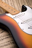 Electric Guitar And Sheet Music Royalty Free Stock Photos