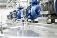 Electric motors on steel tanks for mixing liquids, modern production of alcoholic beverages. royalty free stock photos Electric motors on steel tanks for mixing liquids, modern production of alcoholic beverages. royalty free stock photos