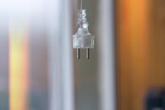 Electric plug on a blurred background hangs royalty free stock images Electric plug on a blurred background hangs royalty free stock images