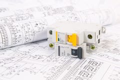 Electrical engineering drawings and modular circuit breaker. stock image Electrical engineering drawings and modular circuit breaker. stock image