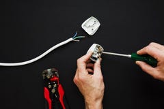 Electrician has plug opened up royalty free stock image Electrician has plug opened up royalty free stock image
