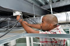 Electrician worked in ceiling panel stock photos Electrician worked in ceiling panel stock photos