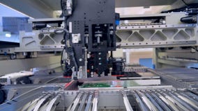 Automated Circut Board machine Produces Printed digital electronic board. 4K. stock footage Automated Circut Board machine Produces Printed digital electronic board. 4K. stock footage