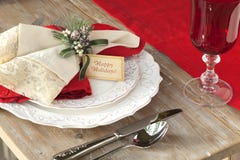 Elegant Christmas dining scene on rustic wood table stock photography Elegant Christmas dining scene on rustic wood table stock photography