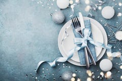 Elegant christmas table setting for holiday dinner top view. Empty space for text. Bokeh effect. Royalty Free Stock Images Elegant christmas table setting for holiday dinner top view. Empty space for text. Bokeh effect. Royalty Free Stock Images