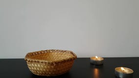 Elegant female hand with beautiful nails picks up a package of bath salt. Burning candles, romantic soothing atmosphere stock video footage Elegant female hand with beautiful nails picks up a package of bath salt. Burning candles, romantic soothing atmosphere stock video footage