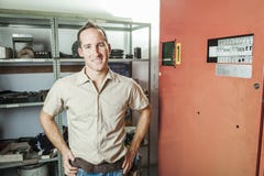 Elevator Repair Man at work stock image Elevator Repair Man at work stock image