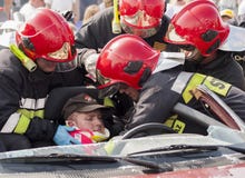 Emergency Crew Removing A Victim From A Car Accident Royalty Free Stock Image Emergency Crew Removing A Victim From A Car Accident Royalty Free Stock Image