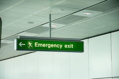 Emergency exit direction signs in a building Royalty Free Stock Photo Emergency exit direction signs in a building Royalty Free Stock Photo