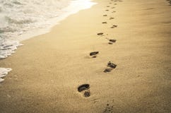 Empreintes de pas dans le sable Photos stock Empreintes de pas dans le sable Photos stock