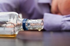 Almost empty bottle of alcohol stock photo Almost empty bottle of alcohol stock photo
