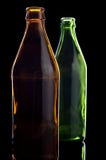 Empty Bottles Isolated On Black Stock Photo