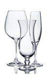 Empty Glasses Of Champagne, Red Wine And Hurricane On White Stock Images Empty Glasses Of Champagne, Red Wine And Hurricane On White Stock Images