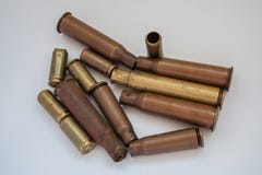 Empty shells from live ammunition to machine gun and pistol stock images Empty shells from live ammunition to machine gun and pistol stock images