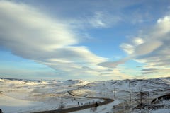 Empty snow covered road in winter landscape stock photo Empty snow covered road in winter landscape stock photo