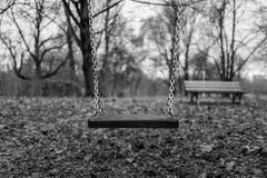 Empty swing on playground royalty free stock images Empty swing on playground royalty free stock images
