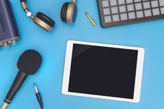 Empty tablet with DJ music producer equipment stock image Empty tablet with DJ music producer equipment stock image