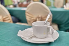 Empty unclean white cup of coffee with spoon in conference Stock Photography Empty unclean white cup of coffee with spoon in conference Stock Photography