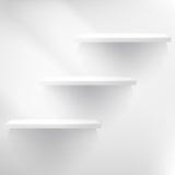 Empty white shelf hanging on a wall. Stock Images Empty white shelf hanging on a wall. Stock Images