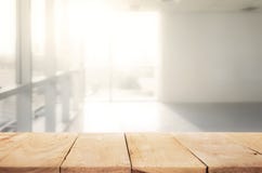 Empty of wood table top with blur sunlight in window building. royalty free stock photo Empty of wood table top with blur sunlight in window building. royalty free stock photo